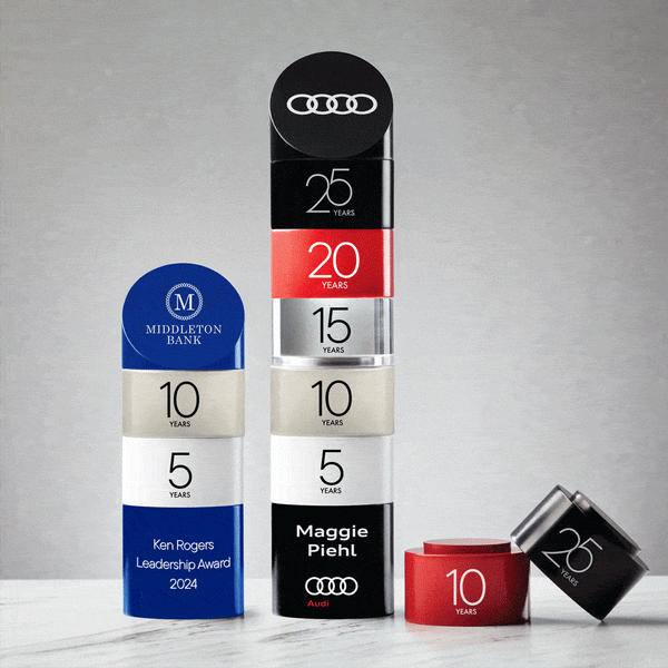 Stackable perpetual trophy with interchangeable colored segments for ongoing recognition.